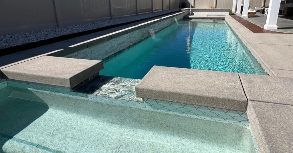 pool with ledge and mosaic tile, concept of 10 Creative Pool Tile Ideas: Borders, Accents, Waterlines